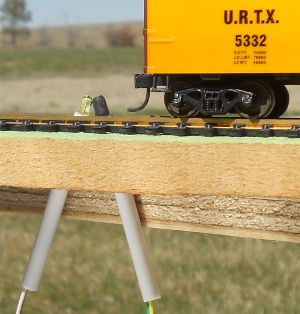 angled sensors between the rails